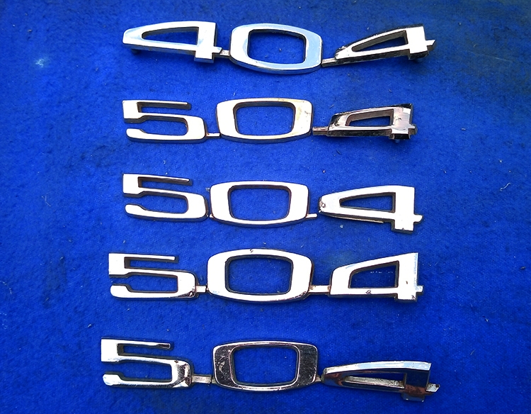 Emblemas de Peugeot 404 y 504